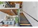 Modern staircase overlooking the kitchen and living areas at 3572 Artists Way, Charlotte, NC 28205