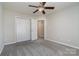 Spacious bedroom with double doors leading to hallway at 3649 Warp St, Charlotte, NC 28205