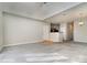 Open living room with high ceilings and a view of the kitchen at 3649 Warp St, Charlotte, NC 28205