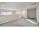 Loft with grey carpet, access to exterior door and natural light at 3649 Warp St, Charlotte, NC 28205