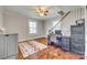 Home office with hardwood floors, desk and ceiling fan at 419 Williamson St, Fort Mill, SC 29715