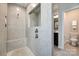 Walk in shower with bench seating and modern tile finishes at 469 Shallowford Dr, Rock Hill, SC 29732