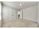 Bright bedroom with double doors and carpet flooring at 469 Shallowford Dr, Rock Hill, SC 29732