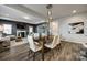 Bright dining room features hardwood floors and a view into the great room at 469 Shallowford Dr, Rock Hill, SC 29732