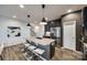 Modern kitchen with dark cabinetry, stainless steel appliances, and large island at 469 Shallowford Dr, Rock Hill, SC 29732