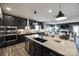 Modern kitchen with dark cabinetry, stainless steel appliances, and large island at 469 Shallowford Dr, Rock Hill, SC 29732