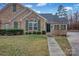 Attractive stone and shingle home exterior with walkway at 4829 Boomerang Way, Charlotte, NC 28269