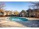 Community pool with surrounding patio and fencing at 4829 Boomerang Way, Charlotte, NC 28269