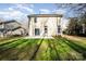 House with backyard patio and grassy area at 509 Tallwood Ct, Charlotte, NC 28216