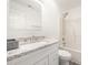 Updated bathroom with granite countertop and bathtub shower combo at 509 Tallwood Ct, Charlotte, NC 28216