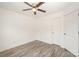 Spacious bedroom with hardwood floors, ceiling fan and double door closet at 509 Tallwood Ct, Charlotte, NC 28216