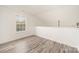 Bedroom with hardwood floors, window and ceiling fan at 509 Tallwood Ct, Charlotte, NC 28216