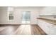 Bright dining area with sliding glass doors to backyard at 509 Tallwood Ct, Charlotte, NC 28216