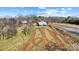 Aerial view of property showing home, outbuildings, and surrounding area at 535 Grampian Rd, Mt Ulla, NC 28125