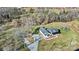 Wide aerial view showing home, driveway, and surrounding landscape at 535 Grampian Rd, Mt Ulla, NC 28125