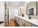 Double vanity bathroom with white cabinets and quartz countertops at 535 Grampian Rd, Mt Ulla, NC 28125