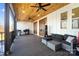 Screened porch with ceiling fan, comfortable seating and grill at 535 Grampian Rd, Mt Ulla, NC 28125