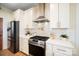 Modern kitchen with stainless steel appliances and herringbone backsplash at 535 Grampian Rd, Mt Ulla, NC 28125