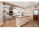 Kitchen island with butcher block countertop, overlooking the living room at 535 Grampian Rd, Mt Ulla, NC 28125