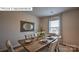 Dining room with wood table and large mirror at 548 Zermatt Ct, Monroe, NC 28112