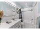 Clean bathroom with white subway tile and gray vanity at 6049 Bluebird Hill Ln, Weddington, NC 28104