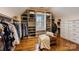 Large walk-in closet with ample shelving and drawers at 6049 Bluebird Hill Ln, Weddington, NC 28104