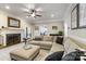 Living room with a cozy sectional sofa and fireplace at 6049 Bluebird Hill Ln, Weddington, NC 28104