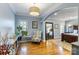 Main bedroom with hardwood floors and sitting area at 6049 Bluebird Hill Ln, Weddington, NC 28104