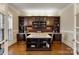 Home office with built-in cabinetry and desk at 6049 Bluebird Hill Ln, Weddington, NC 28104