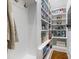 Well-organized pantry with ample shelving for storage at 6049 Bluebird Hill Ln, Weddington, NC 28104