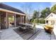 Outdoor patio with seating, rug and pool view at 6049 Bluebird Hill Ln, Weddington, NC 28104