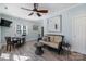 Bright recreation room with a comfy sofa and dining table at 6049 Bluebird Hill Ln, Weddington, NC 28104