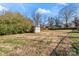 Large backyard with shed and mature trees at 639 Harrison St, Statesville, NC 28677