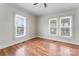 Spacious bedroom with hardwood floors and large windows at 639 Harrison St, Statesville, NC 28677