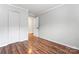 Bedroom with wood floors and access to a bathroom at 639 Harrison St, Statesville, NC 28677