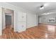 Dining area with hardwood floors and access to kitchen at 639 Harrison St, Statesville, NC 28677