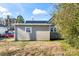 House exterior showcasing grey siding and metal roof at 639 Harrison St, Statesville, NC 28677