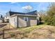 House exterior showcasing grey siding and metal roof at 639 Harrison St, Statesville, NC 28677