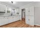 Eat-in kitchen with white cabinets and ample counter space at 639 Harrison St, Statesville, NC 28677