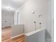 Simple laundry area with hookups and wood floors at 639 Harrison St, Statesville, NC 28677