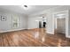 Open living space with hardwood floors and kitchen view at 639 Harrison St, Statesville, NC 28677