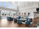 Large clubhouse space with high ceilings and lots of places for people to gather and socialize at 6605 Central Pacific Ave # 301A, Charlotte, NC 28210