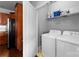 Washer and dryer hookups, shelving and storage, and access to the kitchen at 6605 Central Pacific Ave # 301A, Charlotte, NC 28210