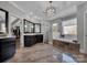 Luxurious bathroom featuring double vanity and large soaking tub at 7704 Seton House Ln, Charlotte, NC 28277