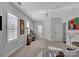 Bedroom with window seat and view of the backyard at 7704 Seton House Ln, Charlotte, NC 28277