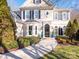 Front entrance with stone walkway and landscaping at 7704 Seton House Ln, Charlotte, NC 28277