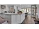 Modern kitchen with white cabinetry and marble countertops at 7704 Seton House Ln, Charlotte, NC 28277