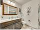 Modern bathroom featuring a stylish vanity with storage, toilet, and shower with curtain at 7832 Winterset Dr, Charlotte, NC 28270