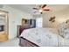 Inviting bedroom with a queen bed, dresser, and carpeted floors at 7832 Winterset Dr, Charlotte, NC 28270