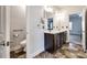 Double vanity bathroom with dark wood cabinets at 859 Accent Se Ave, Concord, NC 28025